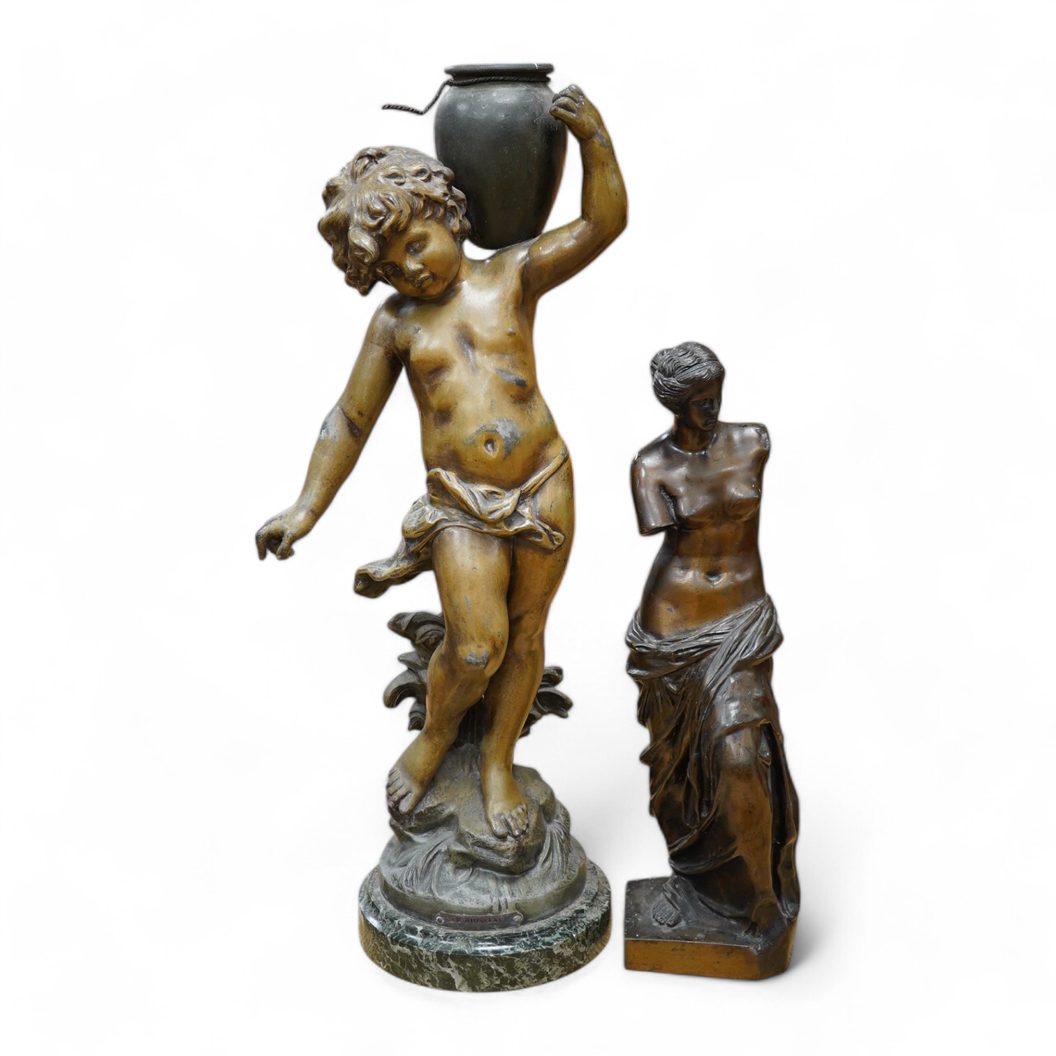 After Auguste Moreau, a 19th century French bronzed spelter figure of an amorini carrying a water pitcher, ‘’Le Ruisseau’’, and another of Venus de Milo (2). Condition - fair to good